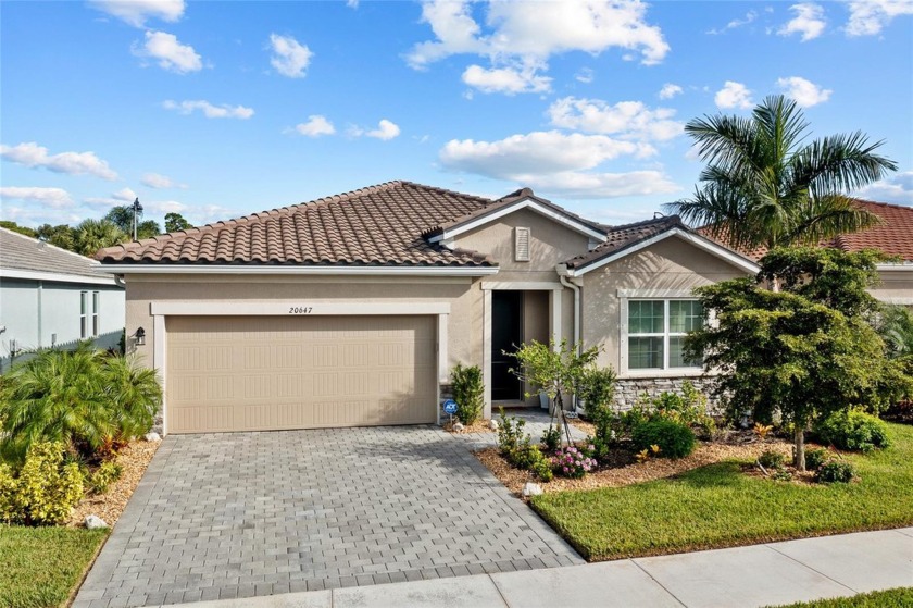 Welcome to this stunning, like-new pool home situated in the - Beach Home for sale in Venice, Florida on Beachhouse.com