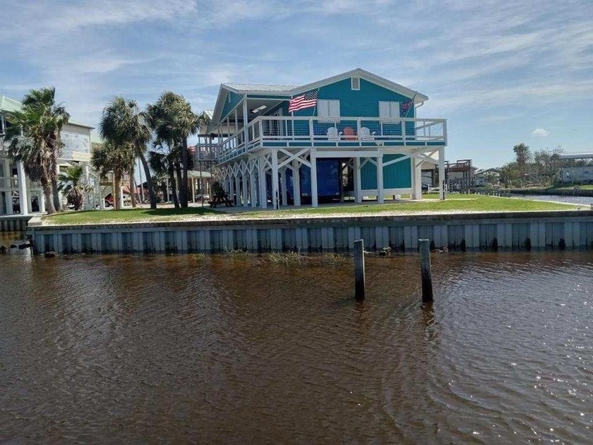 Step onto your deck and watch Redfish and Black Drum swim past - Beach Home for sale in Horseshoe Beach, Florida on Beachhouse.com