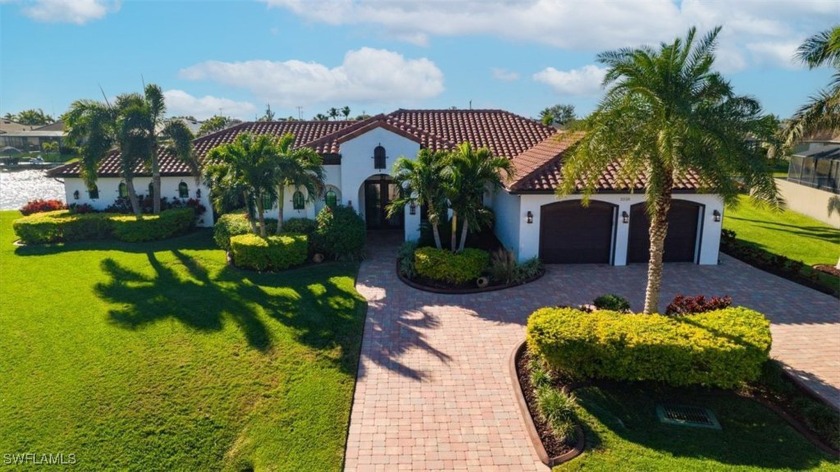 A Truly One-of-a-Kind Spanish-Style Lakefront Retreat in Cape - Beach Home for sale in Cape Coral, Florida on Beachhouse.com