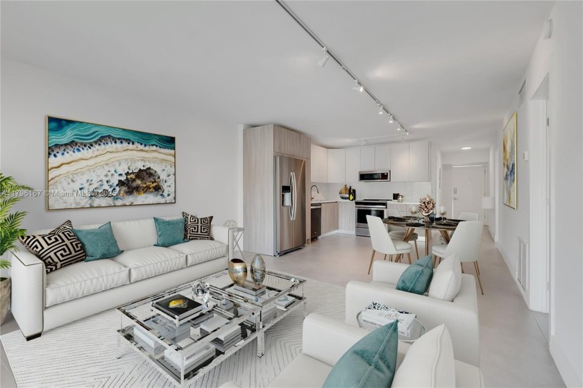 Enjoy living steps from the sand from this beautiful, recently - Beach Condo for sale in Key Biscayne, Florida on Beachhouse.com