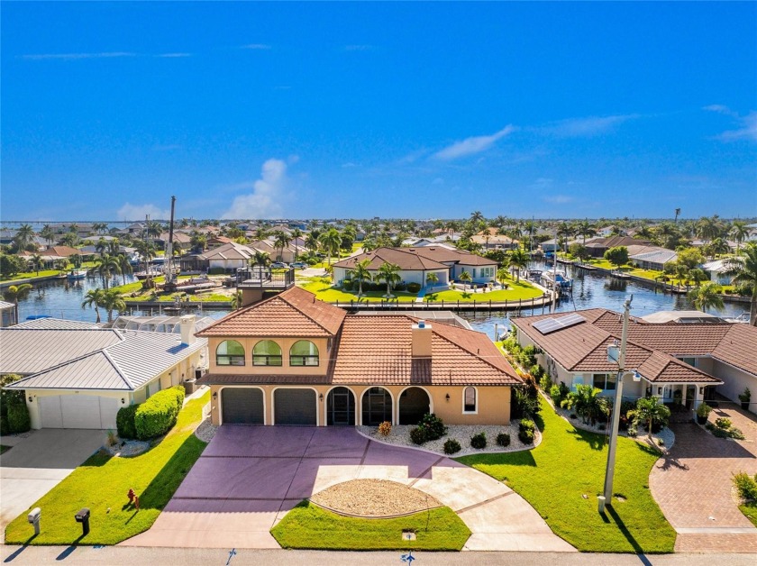 Spacious WATERFRONT HOME offers SAILBOAT ACCESS to Charlotte - Beach Home for sale in Punta Gorda, Florida on Beachhouse.com