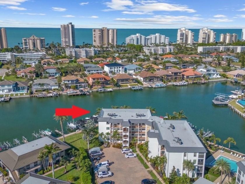 This beautiful top-floor, water-direct condominium at the south - Beach Home for sale in Marco Island, Florida on Beachhouse.com