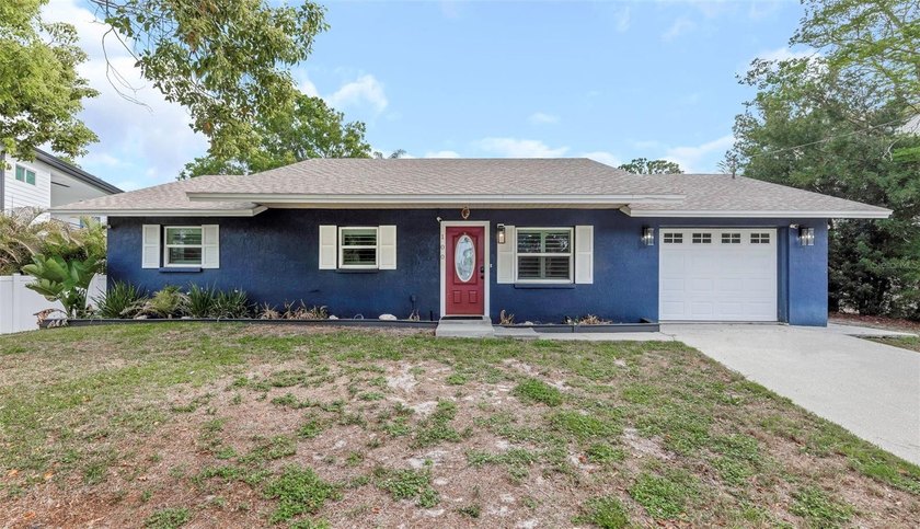 Tucked along picturesque Shore Drive E near the bay, this - Beach Home for sale in Oldsmar, Florida on Beachhouse.com