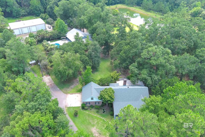 Discover the enchanting Firefly Retreat, a remarkable - Beach Home for sale in Robertsdale, Alabama on Beachhouse.com