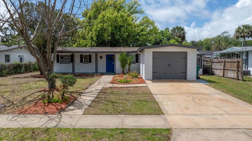 Step into this beautifully updated 3-bedroom, 2-bathroom home - Beach Home for sale in Daytona Beach, Florida on Beachhouse.com