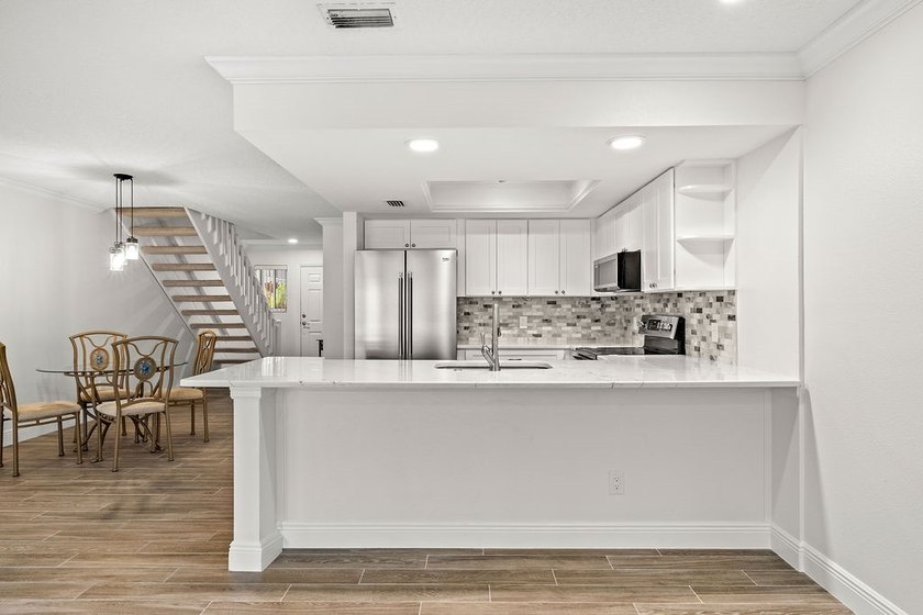 Completely updated 2BD,2BA,1-car garage unit, featuring tile - Beach Condo for sale in Fort Pierce, Florida on Beachhouse.com