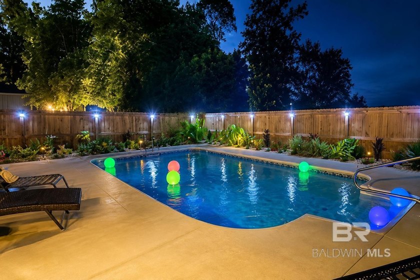 Gold Fortified pool home with a private wooded backdrop and - Beach Home for sale in Foley, Alabama on Beachhouse.com