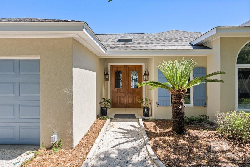 This stunning single-story waterfront residence offers the - Beach Home for sale in Orange Beach, Alabama on Beachhouse.com