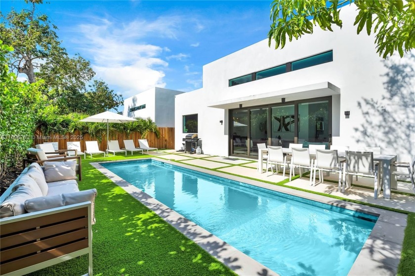 Welcome to modern luxury living and newer construction. Live in - Beach Home for sale in Miami, Florida on Beachhouse.com
