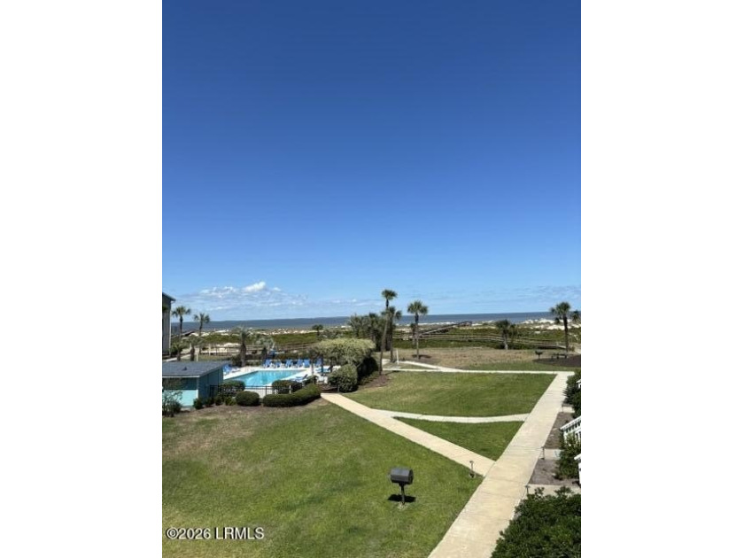 This beautifully maintained furnished two-bedroom condo offers - Beach Condo for sale in Harbor Island, South Carolina on Beachhouse.com