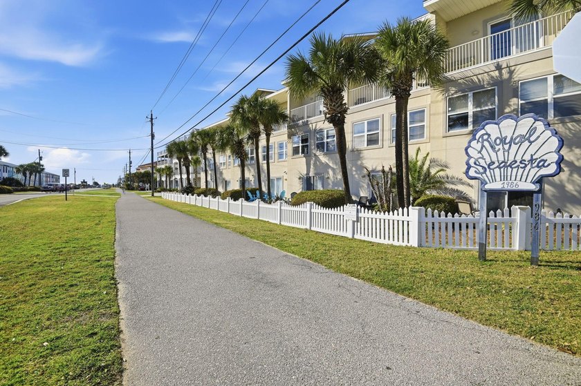 Just a 2-minute walk from the white sands of Miramar Beach, this - Beach Townhome/Townhouse for sale in Miramar Beach, Florida on Beachhouse.com