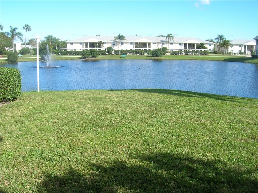 1ST FLOOR UNIT WITH A LAKE VIEW FROM ENCLOSED PORCH CLOSE TO - Beach Condo for sale in Vero Beach, Florida on Beachhouse.com