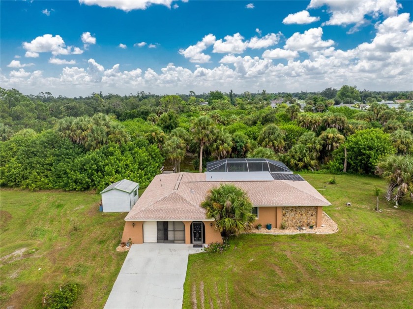 Private and serene. Great location, POOL home on huge oversized - Beach Home for sale in Port Charlotte, Florida on Beachhouse.com