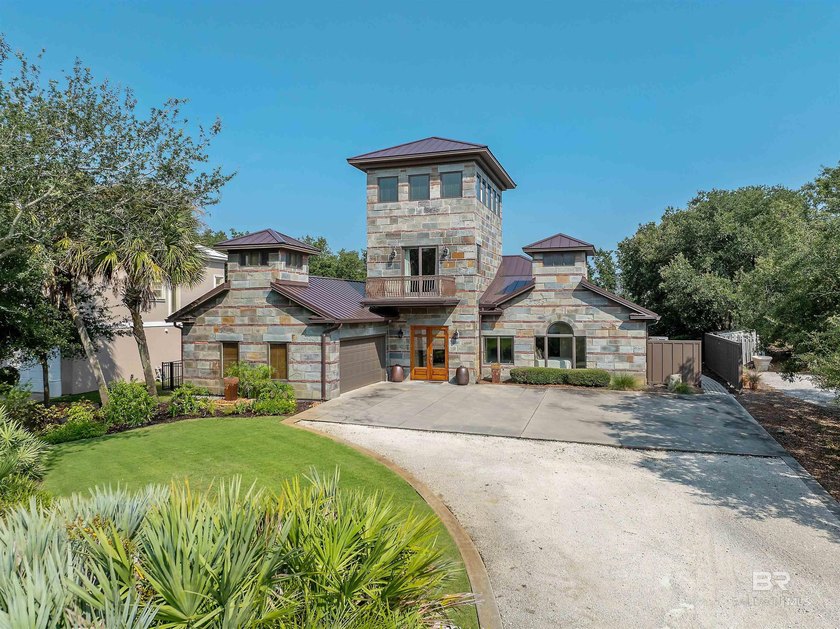 Welcome to this beautifully designed Ono Island waterfront home - Beach Home for sale in Orange Beach, Alabama on Beachhouse.com