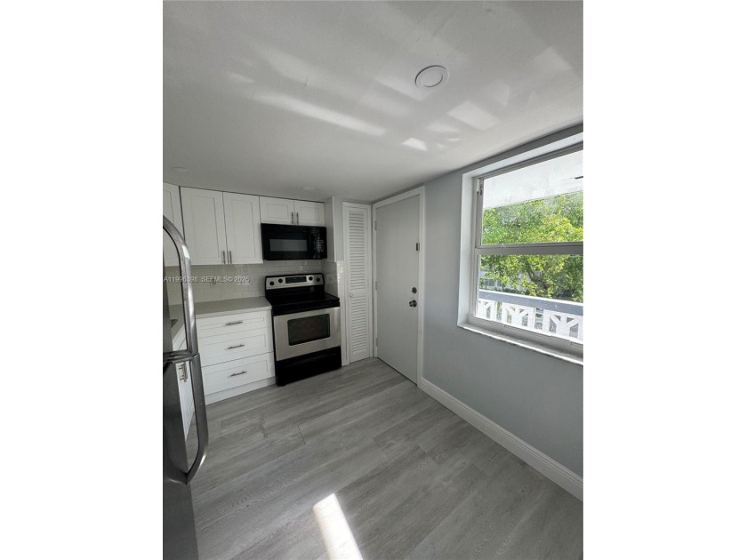 1/1 with a very nice view to the lake, open balcony. Quiet - Beach Condo for sale in Miami, Florida on Beachhouse.com
