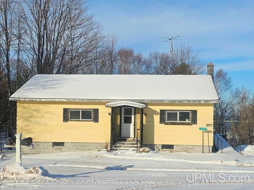 Set along the Lake Superior shoreline in Calumet Township--just - Beach Home for sale in Calumet, Michigan on Beachhouse.com