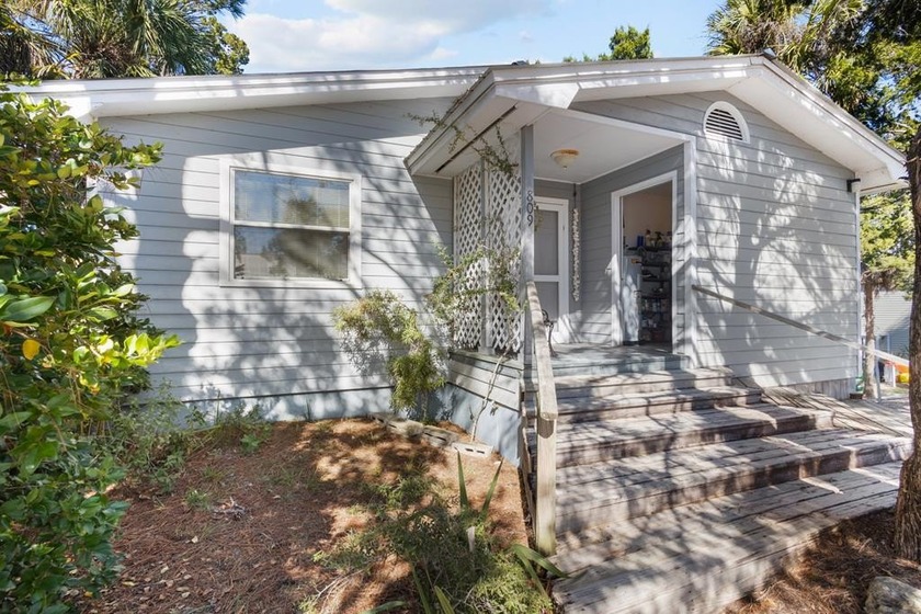 What a find in Cedar Key! Perched high and dry on a hill, this - Beach Home for sale in Cedar Key, Florida on Beachhouse.com