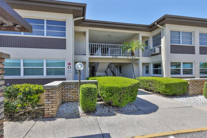 Welcome to this modern coastal living condo, ideally situated - Beach Condo for sale in New Port Richey, Florida on Beachhouse.com
