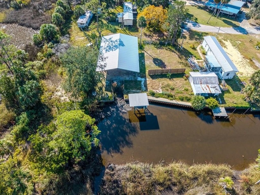 Welcome to Suwannee! This waterfront retreat featuring two - Beach Lot for sale in Suwannee, Florida on Beachhouse.com