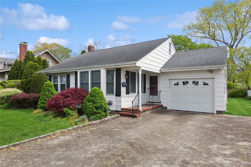 This charming 1950's home located in the heart of Downtown - Beach Home for sale in Riverhead, New York on Beachhouse.com