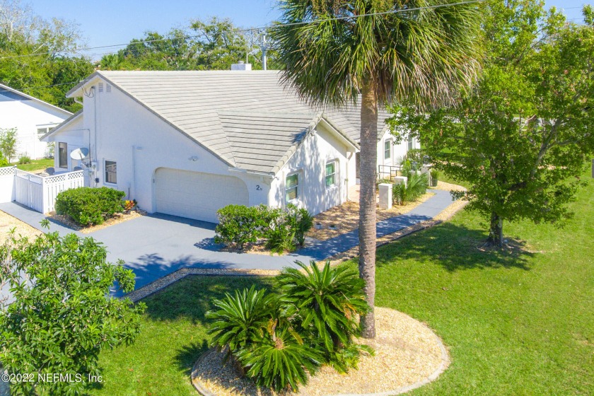 Embrace Florida living in this beautiful Palm Harbor home! - Beach Home for sale in Palm Coast, Florida on Beachhouse.com