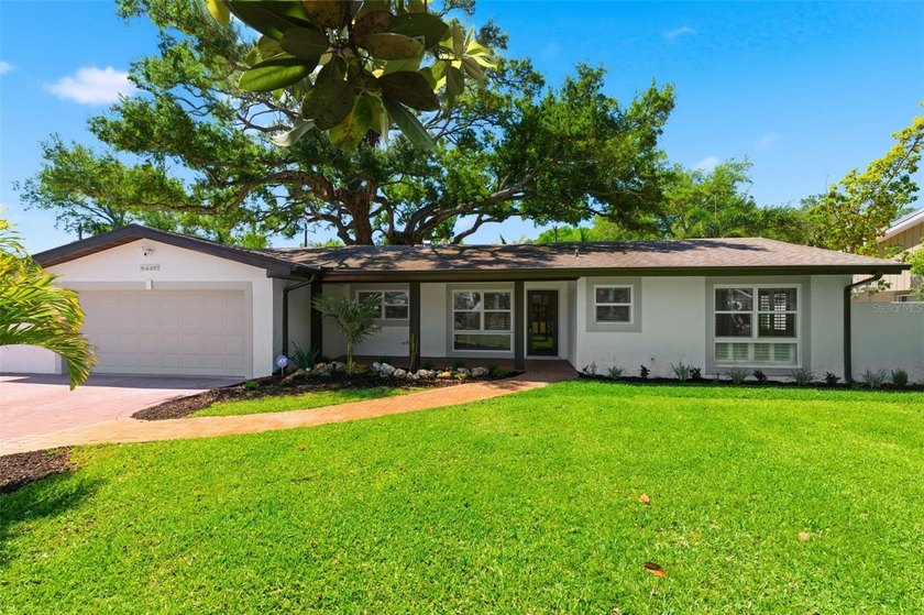 Welcome to the jungle!  This exquisite 1,814 square-foot pool - Beach Home for sale in St. Petersburg, Florida on Beachhouse.com