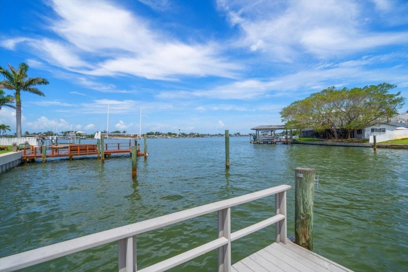 With a graceful nod to Mediterranean style, this waterfront - Beach Home for sale in Largo, Florida on Beachhouse.com