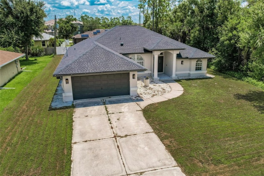 This tastefully appointed home has plenty of room for family and - Beach Home for sale in Port Charlotte, Florida on Beachhouse.com