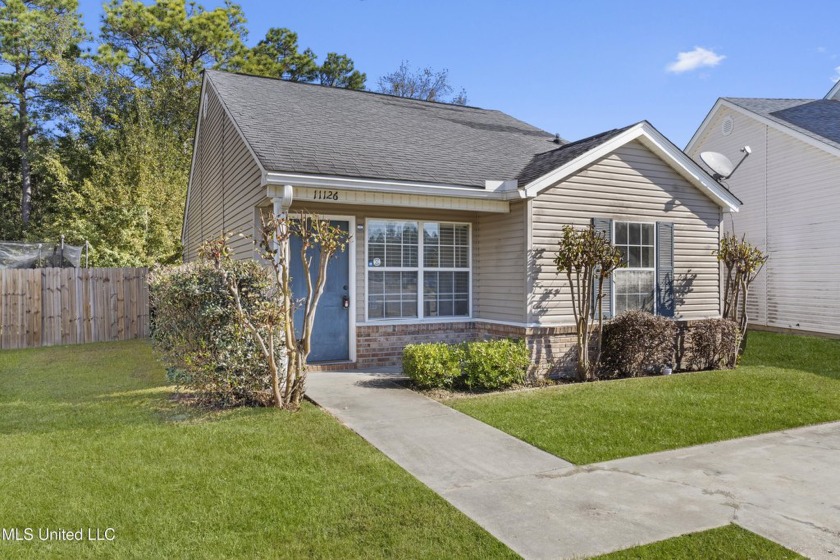 Welcome home to this charming 2-bedroom, 2-bath residence - Beach Home for sale in Gulfport, Mississippi on Beachhouse.com