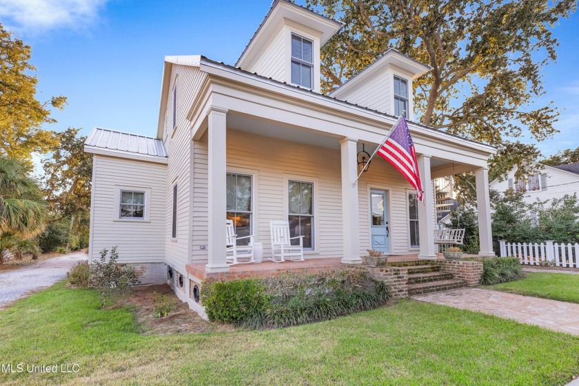 Discover the timeless beauty of the Captain Drackett House, an - Beach Home for sale in Bay Saint Louis, Mississippi on Beachhouse.com