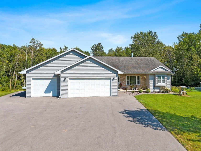 Just a short drive from Green Bay, this home welcomes you with - Beach Home for sale in Little Suamico, Wisconsin on Beachhouse.com