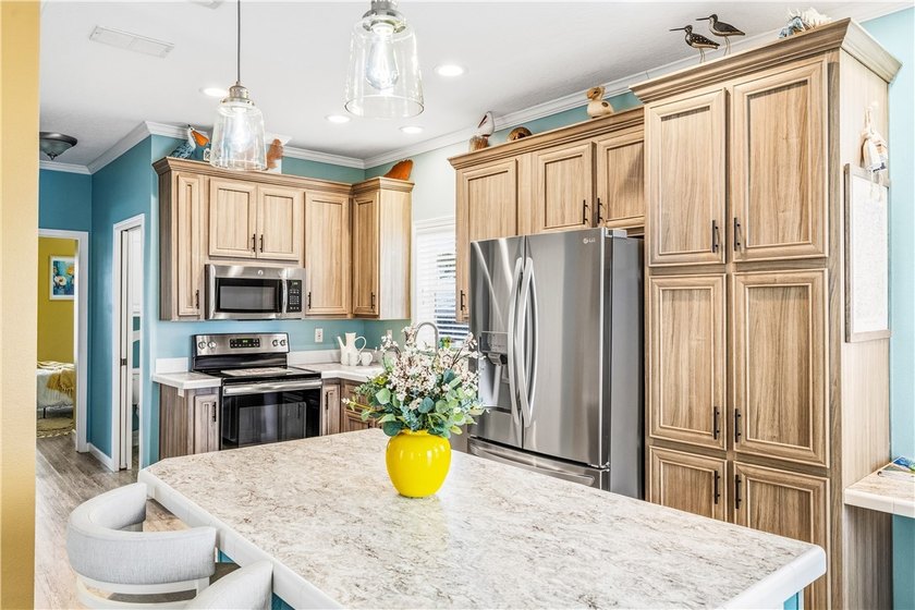 The home delivers a modern, coastal energy with its fun color - Beach Home for sale in Jensen Beach, Florida on Beachhouse.com