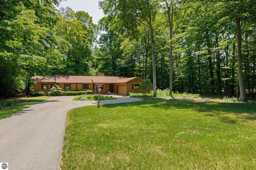 Located just a mile from Leland an easy e-bike ride to - Beach Home for sale in Leland, Michigan on Beachhouse.com