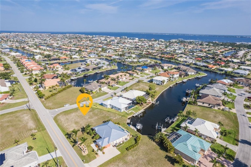 OVERSIZED WATERFRONT LOT IN PUNTA GORDA ISLES. BUILD YOUR DREAM - Beach Lot for sale in Punta Gorda, Florida on Beachhouse.com