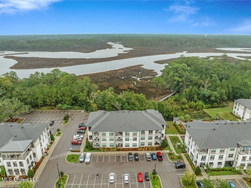 This charming, highly sought-after end unit on the third floor - Beach Condo for sale in Ocean Springs, Mississippi on Beachhouse.com