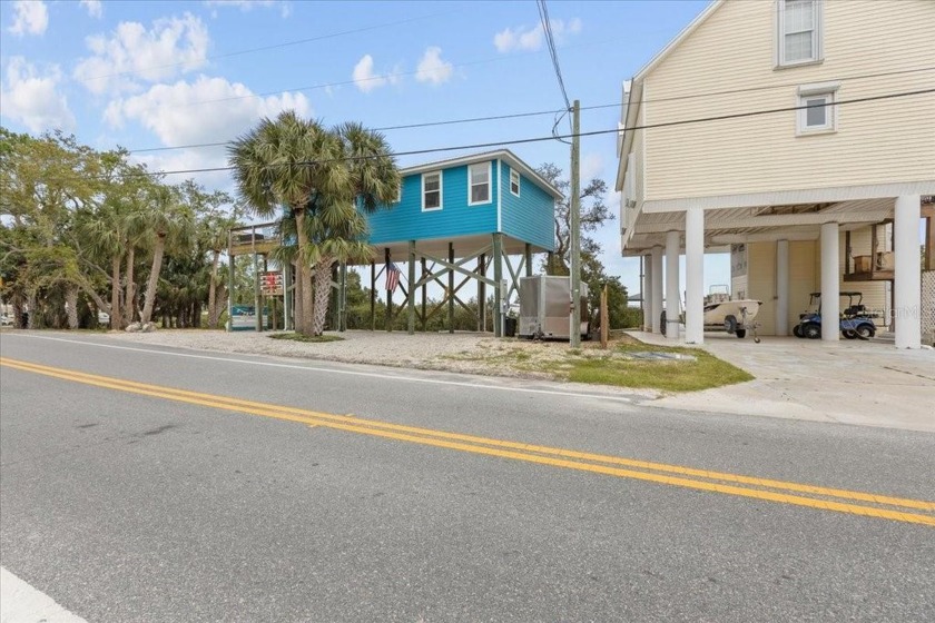 What a small price to pay for a million-dollar view! This home - Beach Home for sale in Cedar Key, Florida on Beachhouse.com