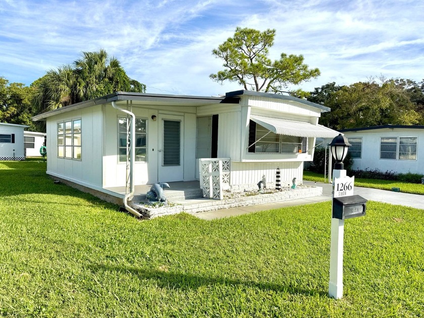 This cozy and well-maintained 1-bedroom, 1-bath manufactured - Beach Home for sale in Daytona Beach, Florida on Beachhouse.com