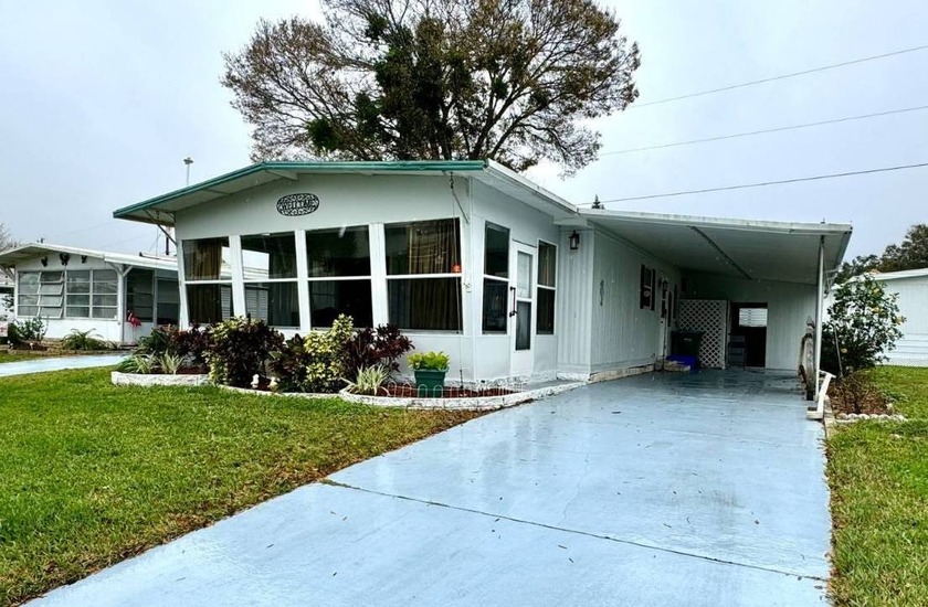 This 1974 Rama home has Ceramic Tile and Laminate flooring - Beach Home for sale in Daytona Beach, Florida on Beachhouse.com