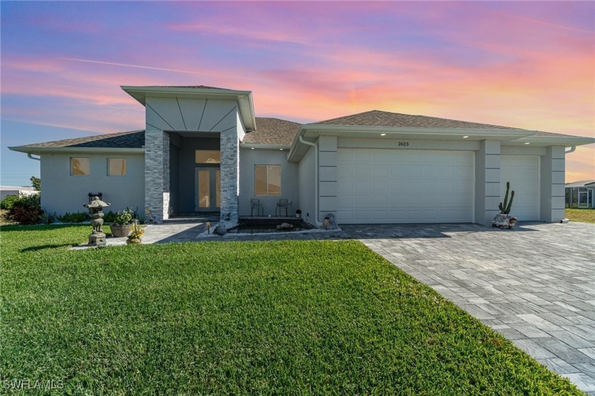 This modern GULF ACCESS HOME presents a spacious and sunlit - Beach Home for sale in Cape Coral, Florida on Beachhouse.com