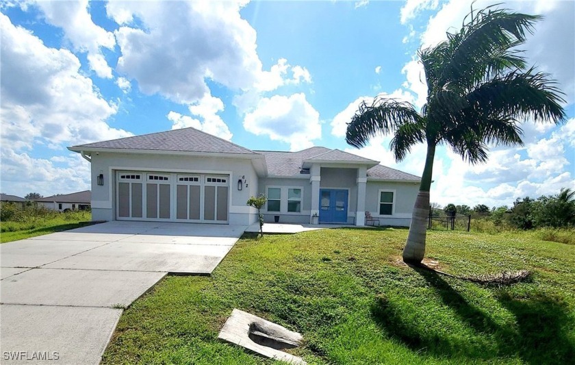 Welcome to this stunning 3-bedroom, 2-bath home with an open - Beach Home for sale in Lehigh Acres, Florida on Beachhouse.com