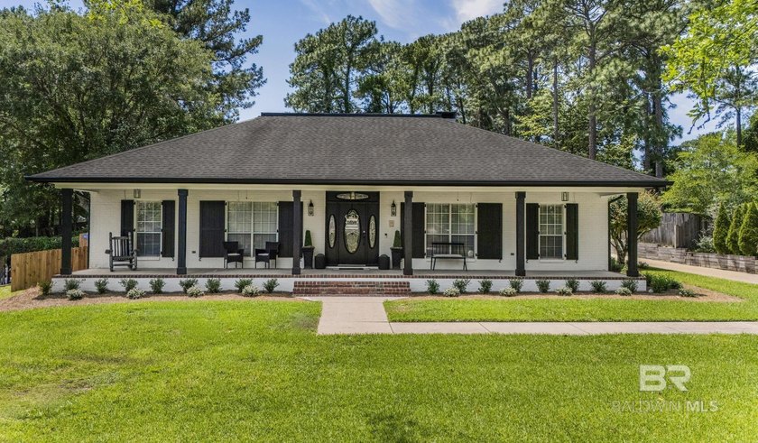 Summer is calling at this beautifully updated 4 bedroom, 2.5 - Beach Home for sale in Spanish Fort, Alabama on Beachhouse.com
