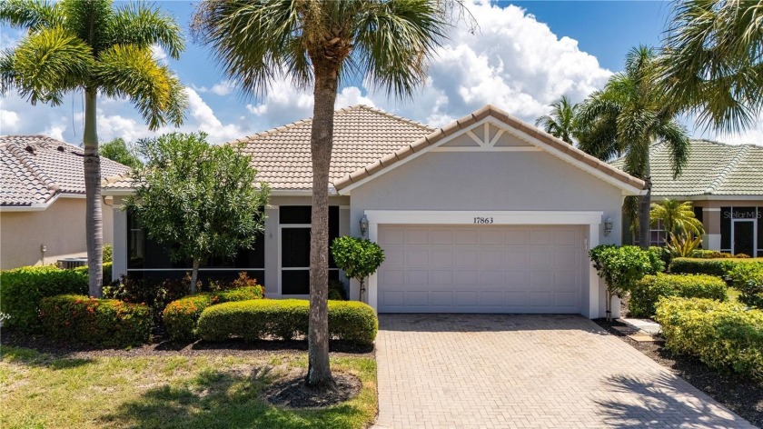 2 bedroom + Den 2 bath 2 car garage lake front home located in - Beach Home for sale in Punta Gorda, Florida on Beachhouse.com