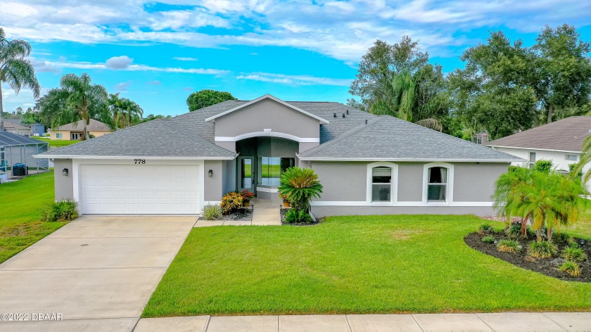 Welcome home! This STUNNING, fully remodeled 4-bedroom, 2-bath - Beach Home for sale in Port Orange, Florida on Beachhouse.com