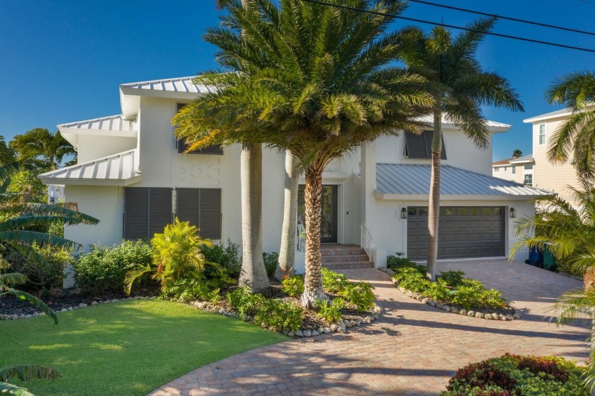 Savor the Coastal Lifestyle in this Elevated, Whitehead - Beach Home for sale in Holmes Beach, Florida on Beachhouse.com