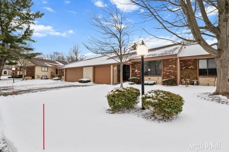 Welcome to 318 Aniline Ave N! Nestled in a quiet residential - Beach Condo for sale in Holland, Michigan on Beachhouse.com