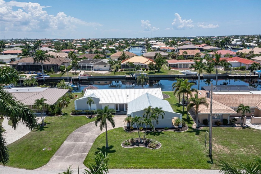 Welcome to your dream waterfront retreat in Punta Gorda Isles! - Beach Home for sale in Punta Gorda, Florida on Beachhouse.com