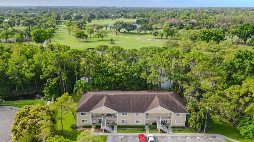 Experience serene living in this beautifully maintained - Beach Condo for sale in Royal Palm Beach, Florida on Beachhouse.com