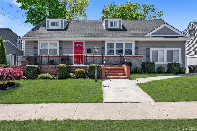 Welcome to this updated 2-family home in the heart of Island - Beach Home for sale in Island Park, New York on Beachhouse.com