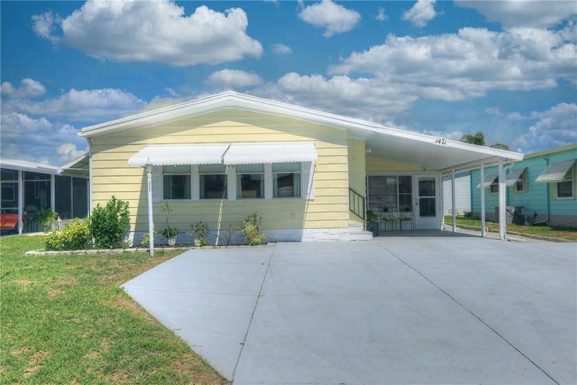 Enjoy your slice of paradise in this cozy 2-bedroom 2 bath home - Beach Home for sale in Barefoot Bay, Florida on Beachhouse.com