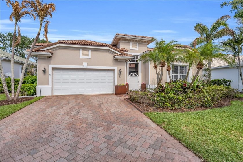Impeccable 4-bedroom, 4-bath courtyard pool residence featuring - Beach Home for sale in Vero Beach, Florida on Beachhouse.com